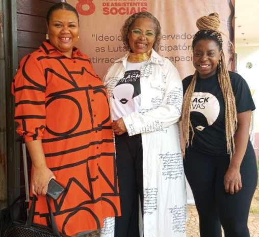 Integrantes em evento com o Dia das Assistentes Sociais